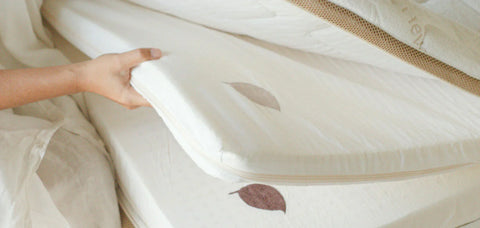 Person Laying Mattress - Are Upholstered Beds Bad for Allergies